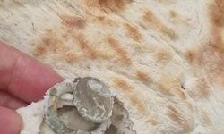 EKMEĞİN İÇERİSİNDEN BOZUK PARA HALKASI ÇIKTI