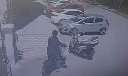 MOTOSİKLET ÜZERİNDE DURAN KASKI ÇALDILAR