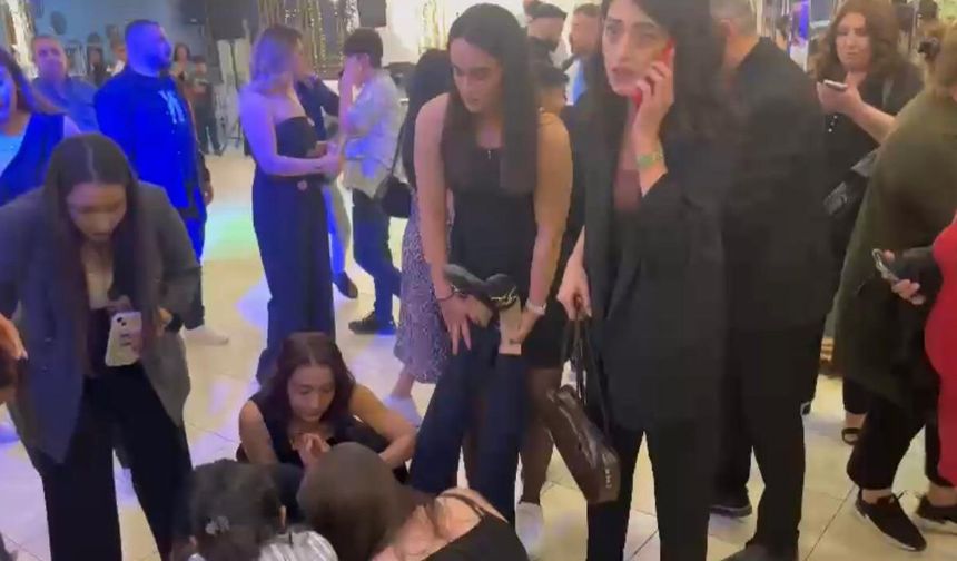 DEPREMDE KORKAN KADIN DÜĞÜN SALONUNDA BAYILDI